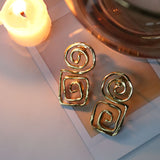 Megara Geometric Spiral Stud Earrings | Sustainable Jewellery by Ottoman Hands
