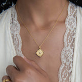 Pearl and White Topaz Shield Pendant Necklace